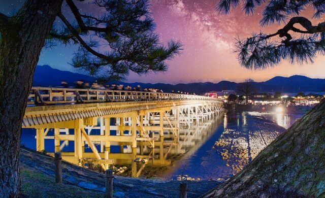 Togetsukyo Bridge at sunset in Arashiyama, Kyoto