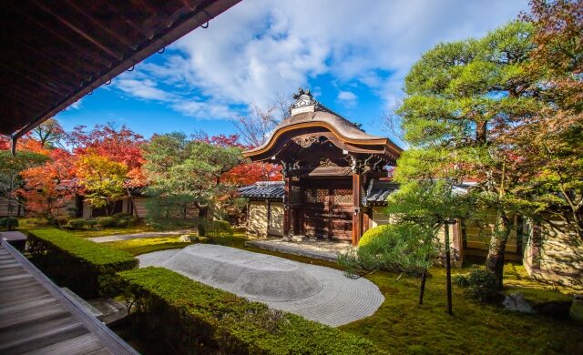 Traditional gate and white gravel garden at Eikando Temple in Kyoto