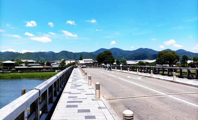 Walking across Togetsukyo Bridge in Arashiyama, Kyoto